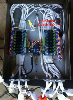 an electrical panel with multiple wires connected to it