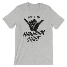 "We print on everything! In our shop you will find our designs mostly on short sleeve shirts, but since we use Printful's printing services we can print any design on any type of shirt or item you can see here: https://www.printful.com/custom-products You are welcome to send us a message if you want a design printed on any of the items on the Printful website. This Is My Hawaiian Shirt | Hawaiian Party | Tropical Holiday | Hawaii Summer T-Shirt | Cool Unisex T-Shirt | Black Rock Hand Humor. This Unisex Short Sleeve Shirt With Text Print, Summer Tri-blend Shirt With Graphic Print, Band Merch T-shirt With Custom Print, Graphic Tee With Letter Print And Short Sleeves, Letter Print Graphic Tee With Short Sleeves, Summer Band Merch Shirt With Custom Print, Summer Black Tri-blend Shirt, Band Merch Shirt With Funny Print And Short Sleeves, Band Merch T-shirt With Custom Print And Short Sleeves