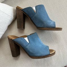 Bought These At A Designer Consignment Store Years Ago And Have Only Worn 3-4 Times So I’m Hoping They Go To A Good Home. Mm6 Sky Blue Wooden Heels. Silver Bottoms, Iconic. 37 Or Us 6.5/7. Heel Height Is 4” And Inside Of Footbed 9 3/4” Inches. Excellent Gently Worn Condition, Not Brand New, Condition Is As Photographed Make An Offer Blue Leather Mules With Wooden Heel, Suede Slip-on Heels With Stacked Heel, Blue Mules With Deep Heel Cup And Open Heel, Blue Suede Slip-on Mules, Blue Mules With Sculpted Heel And Pointed Toe, Blue Pointed Toe Mules With Sculpted Heel, Spring Blue Leather Heels, Blue Leather Heels For Spring, Suede Mules With 4-inch Heel