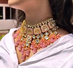 Indulge in timeless elegance with our  High-Quality Kundan Jewellery This exquisite set features stunning pink peach tumbles, adorned with intricate hand-painted details.  Perfect for weddings and special occasions, this Indian and Pakistani-inspired jewellery set includes a maangtika and is designed to elevate your bridal look.  Embrace the richness of tradition and make a statement with this high-quality Kundan jewellery, adding a touch of glamour and sophistication to your ensemble. Item includes Necklace , earrings and maangtika Necklace length 18 inches with an adjustable zari dori at the back Earrings length 3 inches Can be customised in any colour. Please message us for the colour customisation you require. Luxury Pink Kundan Necklace For Festive Season, Luxury Pink Kundan Necklaces, Pink Meenakari Necklace For Reception, Pink Kundan Necklace With Meenakari For Reception, Heavy Pink Kundan Necklace For Reception, Pink Tilla Bridal Necklace, Pink Bridal Necklace With Tilla, Statement Wedding Jewelry, Kundan Choker Necklace