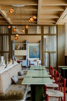 a long table and chairs in a room