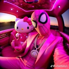 a hello kitty sitting in the back seat of a car next to a spider man