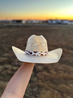 This beaded hat band will bring to your western look. Featuring bright, intricate beading, this hat band will bring a pop of color and texture to your wardrobe. Make a statement with this unique accessory. - The Beaded Portion of the hat band is 21 inches - The leather adds a extra 10.5 inches. The leather ties makes the hat band adjustable to your own hat. (Hat is not included) I do the Beaded work and my boyfriend does the leather work of the hat bands.  ( These hat bands take 3-4 weeks depending on the orders that might be in front of you) ( Disclaimer: All items are uniquely crafted and created by GenZCreations. Our Items are NOT AUTHENTIC American Indian or Alaska Native American nor do they represent any Indian Tribe) Luxury White Western Style Hat Bands, Cheap Classic Hat Bands For Spring, Western Braided Hat Band With Flat Brim, Western Style Braided Hat Bands For Flat Brim, Braided Western Hat Bands, Western Braided Sun Hat For Rodeo, White Southwestern Adjustable Hat, Southwestern White Adjustable Hat, Western Braided Hat Bands For Rodeo