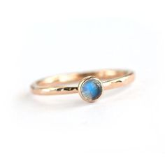 Add a little everyday luxury with this 14k gold rainbow moonstone stacking ring. Each high-grade moonstone flashes brilliantly on this simple timeless solid 14k yellow gold setting. The ring is given my signature micro-facet texture. Pair it with my gold Lina band and they will make a beloved wedding set. For size larger than 10, please contact me for a quote. Material: 14k solid yellow gold Band width: 1.7mm Stone size: 4mm Signature micro-facet texture This ring is made-to-order so please allo Stackable 14k Yellow Gold Moonstone Ring, Dainty 14k Yellow Gold Moonstone Ring, Minimalist Yellow Gold Moonstone Ring With Bezel Setting, Minimalist 14k Gold Moonstone Ring With Bezel Setting, Minimalist Yellow Gold Moonstone Ring For Everyday, Delicate 14k Gold Moonstone Birthstone Ring, Everyday 14k Gold Moonstone Birthstone Ring, Minimalist Yellow Gold Moonstone Solitaire Ring, Minimalist Yellow Gold Solitaire Moonstone Ring