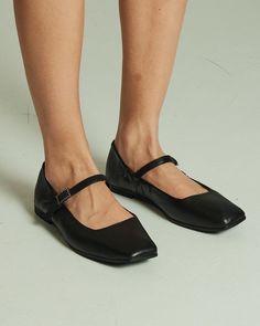 Elevate your everyday style with the Krula Black Leather Ballet Flats. Crafted from premium natural black leather, these ballet flats offer a timeless look with a modern twist. The soft insole ensures all-day comfort, making them perfect for both casual outings and long days on your feet. Designed with a 1 cm platform for subtle lift, these shoes combine elegance and practicality. The square toe and delicate strap add a chic touch, while the secure buckle fastening provides a snug fit. Experienc Chic Black Ballet Flats With Buckle Closure, Black Leather Slip-on Ballet Flats, Modern Pointed Toe Ballet Flats For Everyday, Black Ballet Flats With Rubber Sole For Spring, Modern Everyday Ballet Flats, Black Mary Jane Flats For Spring, Black Ballet Flats With Rubber Sole For Fall, Elegant Black Ballet Flats For Everyday Wear, Elegant Black Ballet Flats For Everyday