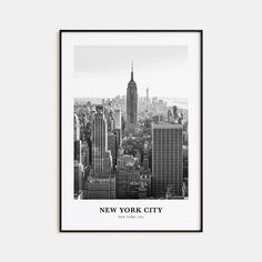 the new york city skyline is shown in black and white, framed on a wall