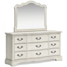 a white dresser with a mirror on top of it and drawers in front of it