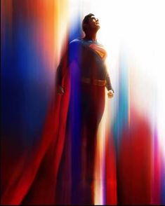 a man in a superman suit standing with his hands on his hips and looking up at the sky