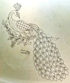 a drawing of a peacock is shown on a piece of paper