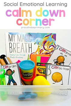 a plastic container filled with children's books and other activities to learn calm down corner