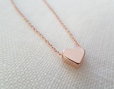 So sweet and adorable, you would want to wear it everyday! CHOOSE your length 15-18 inches. Fast shipping within 1-3 days Comes in a Gift Box . Ready for your special presentation -Rose gold plated heart charm 8.5 * 7.2 mm , Thickness 3.2 mm -Rose gold plated chain 15-18 inches -Lobster clasp Please read the store policy before purchase www.etsy.com/shop/TiffanyAvenueBridal/policy?ref=shopinfo_policies_leftnav Thank you! ♥ Gold Chains Designs, Rose Gold Heart Necklace, Rose Gold Accessories, Necklace Everyday, Black Gold Jewelry, Wedding Bridesmaid Jewelry, Rose Gold Heart, Gold Heart Necklace, Rose Gold Jewelry