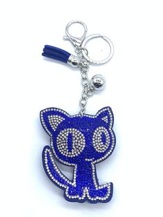 a key chain with a blue cat on it