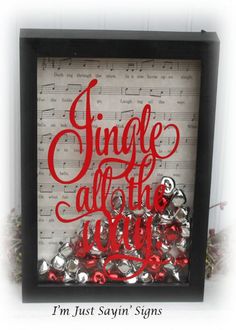 a black frame with red lettering that says, sing all the way