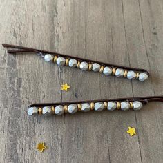 Beaded bobby pins are the perfect hair accessory! Silver beads complemented with smaller gold beads. Secured with nylon thread to a brown bobby pin. These larger bobby pins make a unique gift or bridal accessory. Made with love for superior durability for everyday wear.  2 3/4 inches long. Gemstone Hairpins: https://www.etsy.com/shop/BriteComet?ref=seller-platform-mcnav§ion_id=24822473 Pearl Hairpins: https://www.etsy.com/shop/BriteComet?ref=seller-platform-mcnav§ion_id=24851366 Everything: https://www.etsy.com/shop/BriteComet Beaded Bobby Pins, Bead Hair Accessories, Bobby Pin Hairstyles, Bridal Accessory, Pearl Hair Pins, Bobby Pin, Hair Beads, Hair Pin, Perfect Hair