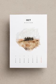 a calendar with an image of trees on it