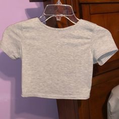 This Is Brand New With Tags Grey Shirt Sleeved Shirt. It Is A Size 4 And Runs Small Trendy Fitted Plain Tops, Fitted Basic Plain Tops, Trendy Cropped Gray Tops, Trendy Gray Cropped Tops, Gray Plain Summer Tops, Gray Plain Tops For Summer, Fitted Cotton Plain Tops, Fitted Plain Cotton Tops, Plain Cotton Crop Top For Spring