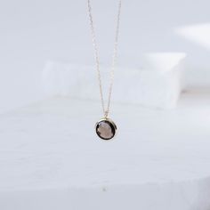 Dainty smoky quartz necklace in 14K solid gold. Simple and dainty necklace for women who love colors. The best gift for her. 100% handcrafted with love! PRODUCT DETAILS ● Material: 14K solid gold - white gold - rose gold ● Gemstone: Smoky Quartz, round briolette cut ● Stone Diameter: 10mm (0.4in) ● Length: 42cm (16.5in) to 45cm (17.5) HOW TO ORDER - CUSTOM ORDERS ●Choose from the drop down menus the available options (Metal, Length) and leave us a note for any special requirements. ●For special Smoky Quartz Yellow Gold Jewelry Gift, Yellow Gold Smoky Quartz Jewelry Gift, Elegant Gold Smoky Quartz Necklace, Smoky Quartz Pendant Necklace Gift, Smoky Quartz Pendant Necklace For Gift, Classic Smoky Quartz Jewelry As A Gift, Classic Smoky Quartz Jewelry As Gift, Gold Smoky Quartz Necklace For Gift, Elegant Smoky Quartz Gemstone Necklace