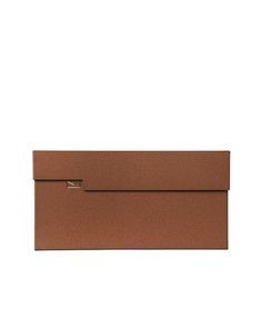 a brown envelope with a metal clasp on the front and an open flap at the bottom