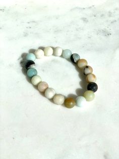 Coronado Bracelet – The Nod Boutique Trendy Gemstone Bead Jewelry, Trendy Everyday Gemstone Beads Jewelry, Spiritual Adjustable Jewelry With Round Stone, Hand-strung Amazonite Beaded Bracelets As Gift, Amazonite Hand-strung Bracelet As A Gift, Trendy Natural Stone Jewelry For Everyday, Healing Amazonite Hand-strung Jewelry, Amazonite Stretch Bracelet With Round Beads As Gift, Handmade Amazonite Bracelets As Gift