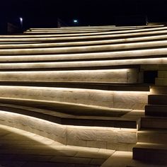 the steps are lit up at night with dim lighting on them and there is no image here to provide a caption for