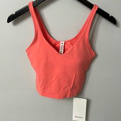 Coral Crop V-Neckline Lululemon Athletic Top. Brand New With Tags. Cleaning Out The Closet! Bodycon Dress Homecoming, Align Tank, Athletic Clothes, Dance Clothes, Dress Homecoming, Poshmark Finds, Athletic Top, Athletic Outfits, The Closet