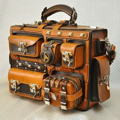 three pieces of brown leather luggage stacked on top of each other with handles and zippers