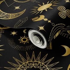 an artistic black and gold wallpaper with sun, moon and stars