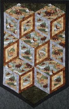 a quilted wall hanging with animals and trees on it's sides, in the shape of hexagons