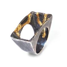 "This oxidized silver ring that features 22k gold embellishments is the best ring to show off your edgy style. It also makes a great gift for your trendsetting mom.  A timeless piece that can go from office hours to after hours with ease!  Check out this one that features an 18k gold set red garnet 👉 https://www.etsy.com/listing/734774458/ 🔶 Materials ▫️ Oxidized sterling silver   ▫️ 22K gold embellishments  🔶 Dimensions ▫️ Width (top): 0.57\" (14.5 mm) ▫️ Available ring sizes: 5-11 US, 1/4 size increments  🔶 Don't know your US ring size?  🔹 Using a Different Ring Size System?  ▫️ Look at the chart in the last photo of this listing to compare your British, European or German ring size to get your US size.  ▫️ If your size is outside the chart limits, please contact me.  🔹 Measure You Valentines Day Gift For Girlfriend, Mixed Metal Ring, Best Ring, Jungle Style, Modern People, Urban Jewelry, Mixed Metal Rings, Oxidized Silver Rings, Chunky Ring