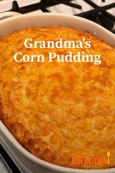 a close up of a casserole on a stove with the words grandma's corn pudding