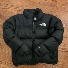 In Excellent Condition. Worn Only A Couple Times Color - Recycled Tnf Black Chest Waist Hips Arm Length L 39-41 In 32-34 In 41-43 In 33.3 In Fit: Relaxed, Hip-Length Silhouette / Interior Hem Shock Cord For Adjustability Warmth: 700-Fill Down Insulation For Premium Loft And Compression Sustainability: 100% Recycled Body, Lining And Overlay Fabrics Durability: Ripstop Fabric With Solid Taffeta Blocking For Abrasion Resistance Details: Attached Three-Piece Hood Packs Into Collar / Secure-Zip Hand North Face Puffer Jacket Aesthetic, The North Face Black Puffer Jacket For Winter, Puffer Jacket Aesthetic, The North Face Black Hooded Puffer Jacket, The North Face Black Hooded Fleece Jacket, Northface Puffer, The North Face Black Long Sleeve Fleece Jacket, North Face Puffer Jacket, The North Face Windproof Long-sleeve Outerwear