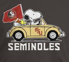 a t - shirt with a snoopy driving a car and the word semnoles on it