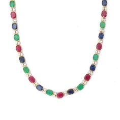 This is part of Chairish’s Fine Jewelry assortment.  Multi Gemstone Necklace in 18K Gold studded with oval cut emerald, ruby, sapphire pieces and diamonds. Accessorize your look with this elegant multi gemstone beaded necklace. This stunning piece of jewelry instantly elevates a casual look or dressy outfit. Comfortable and easy to wear, it is just as exquisite worn alone or layered with other charms for a modern fashion statement.  PRODUCT DETAILS :-  > Material - 18K Solid Yellow Gold  > Gemst Fine Jewelry Oval Emerald Necklace With Jewels, Oval Emerald Necklace With Jewels In Fine Jewelry Style, Oval Emerald Necklace With Jewels, Elegant Multicolor Gemstone Emerald Necklace, Elegant Multicolor Oval Beads Jewelry, Elegant Multicolor Gemstone Necklace, Elegant Multicolor Single Strand Gemstones, Elegant Oval Emerald Necklace With Gemstone Beads, Diamond Wedding Necklace