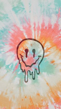 a tie dyed shirt with a skull drawn on it