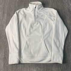 Vintage 2000s Nike Swoosh Check Sportswear Athletic Y2K Aesthetic Streetwear White Half Zip Up Fleece Sweater Medium Women Condition:   Fair Used Condition  = Staining On The Front Of The Sweatshirt Due To Age And Wear Measurements: Please see photos above for all measurements IF YOU BUY TWO OR MORE ITEMS USE THE CODE BUNDLE @ CHECK TO SAVE 20% WE SHIP WITHIN 24 HOURS AFTER PURCHASE! Please be aware that we do not offer free returns!! The Buyer is responsible for the cost of the return label.  Follow us on TikTok & Instagram @findsnostalgic and tag us in your finds Sports Half-zip Fleece Sweatshirt, Sporty Long Sleeve Fleece Jacket For Sports, White Fleece Sports Jacket For Winter, White Fleece Jacket For Sports In Winter, White Fleece Half-zip Top, White Fleece Jacket For Winter Sports, White Long Sleeve Sports Fleece Jacket, White Long Sleeve Fleece Jacket For Sports, White Sporty Fleece Jacket For Sports