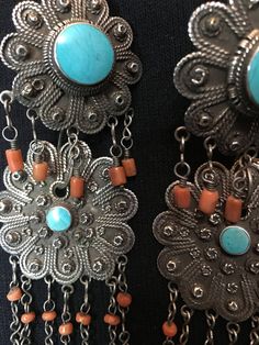 "Earrings ~ Afghanistan, Antique pair of earrings, Silver, Coral and Turquoise. 1930s early to mid 20th century. Length: 6\" Width: 1 3/4\" Tribal Silver Such an Amazing Find. Yes ~ along with basic simplicity ~ It's all about you You deserve to know about my fabulous Treasure chest HeartbeatHandmade and Big Sur Jade Treasures both (Etsy sites) Tribal Jewelry, Statement Piece Jewelry, Art to Wear Jewelry, Fantastic Fine Leather Beaded Handbags, an array of treasures for the traveler and mystic w Vintage Chandelier Earrings With Intricate Design, Traditional Turquoise Jewelry With Filigree, Traditional Turquoise Filigree Jewelry, Vintage Turquoise Jewelry With Intricate Design, Collectible Bohemian Earrings, Bohemian Turquoise Earrings With Intricate Design, Turquoise Bohemian Earrings With Intricate Design, Bohemian Collectible Earrings, Vintage Turquoise Round Earrings