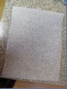 a piece of white paper sitting on top of a counter