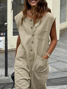 When it comes to being comfortable, light and beautiful, Jumpsuits are the ideal garment for that relaxed and cool style that you want to project. It is versatile, easy and quick to combine, it stylizes the body and can be used by any woman of any age. This practical beige jumpsuit is perfect for you, it will give you a unique casual style. It features a sleeveless. Front and back pockets. V- neckline. Cotton. Buttons down front closure. Color may be lighter or darker depending of the device it High Heel Wedges Platform, Beige Jumpsuit, Beautiful Jumpsuits, Romper And Jacket, Wide Pants, Sleeveless Jumpsuits, Dress With Boots, Flare Pants, Design Inspo