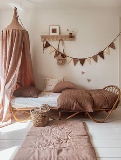 a bedroom with a bed, hammock and pillows