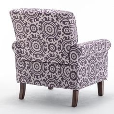 a purple and white patterned chair sitting on top of a wooden leg rest with legs