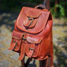 Modern and trending, made to move. This urban-inspired cute small leather backpack is perfectly sized for all your city essentials. This classy cute backpack is best for school, mini trips and college. Salient Features Material: Goat Leather Color: Brown Storage Capacity: Consists of a large central compartment, and three front pockets. Hardware: Zip, Zip Slider, and buckles are manufactured from pure brass for an overall posh look. Best for - women and Girls Sizes In Inches 13H x 8W Sizes In Cm Leather Shoulder Bag For Travel And Back To School, Leather Backpack For Daily Use And Back To School, Leather Backpack For Everyday Use, Back To School, Casual School Backpack With Leather Lining, Leather Backpack For Daily Use, Back To School, Casual Leather Backpack For Adventure, Casual School Bags With Leather Lining, Small Leather Backpack, Cute Backpack