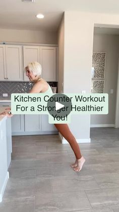 a woman standing in the middle of a kitchen next to a counter top with text overlay that reads, kitchen counter workout for a story healthier you?