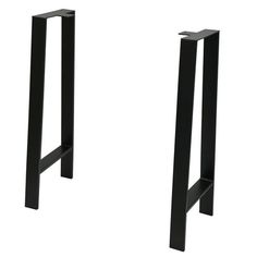 two black metal barstools sitting next to each other on a white background,