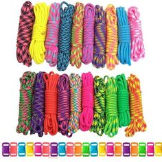 many different colored ropes are lined up on the white background with each one being held by an individual's hand