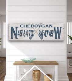 a wooden sign that says cheboygan, n454 - 4770