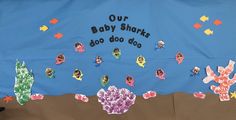 a child's bulletin board that says our baby shark, too do do