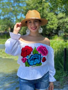 This Beautiful Mexican blouse has a unique Bell Sleeve design, elastic around the waist and embroidered flowers in the front. This blouse comes in one size which fits sizes Small and Medium. Find more colors here: https://www.etsy.com/es/listing/798642680/blusa-mexicana-con-mangas-acampanadas?ref=listing_published_alert Mexican Blouse, Traditional Mexican, Off The Shoulder Top, Boho Blouses, Embroidered Blouse, Floral Blouse, Sleeve Designs, Embroidered Flowers, Bell Sleeve