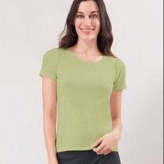 Our Blue Canoe Basics Short Sleeve Is Never Boring. This Tee Is No Exception. Our Silky Soft Bamboo Blend Feels Luxurious Against The Skin, And The Body-Skimming Fit Is Flattering. This Lightweight Fabric Is Very Soft And Has A Beautiful Drape. 28% Organically Grown Cotton/66% Rayon From Organically Grown Bamboo/6% Spandex Made In The Usa High Rounded Neckline Hip Length Body Skimming Fit Latex Free Machine Wash Cool, Low Tumble Dry Green Short Sleeve Plain Top, Green Stretch Plain Tops, Basic Short Sleeve Top For Spring, Green Fitted Top With Scoop Neck, Green Scoop Neck Fitted Top, Green Fitted Scoop Neck Top, Green Fitted Short Sleeve Casual Top, Casual Fitted Green Short Sleeve Top, Fitted Green Short Sleeve Casual Top