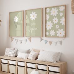 a room filled with lots of furniture and pictures hanging on the wall above it's headboard