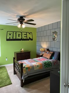 a bedroom with green walls and a bed